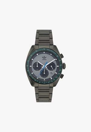 Sportuhr mit einem dunklen Metallarmband, grauem Zifferblatt, grünem Lünette und drei Hilfszifferblättern. Verfügt über einen blauen Sekundenzeiger und weiße Stundenmarkierungen.