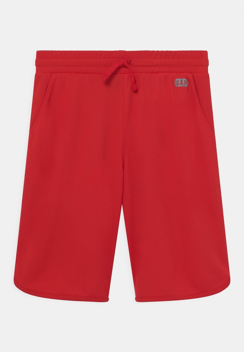 Shorts de sport rouges avec taille élastique, cordon de serrage, poches latérales et petit logo réfléchissant GAP sur la hanche droite.