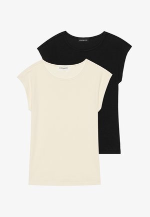 Δύο μπλούζες με κοντά μανίκια: μία μαύρη, μία κρεμ. Και οι δύο διαθέτουν στρογγυλή λαιμόκοψη και απαλή, ραβδωτή υφή. Μίνιμαλ σχεδίαση χωρίς σχέδια.