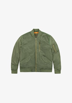 Oliivivihreä pommikonejacketti, joka on tehty sileästä, kevyestä kankaasta. Varustettu ribbausrannekkeilla ja helmalla, kahdella sivutaskulla ja vetoketjullisella rintataskulla.