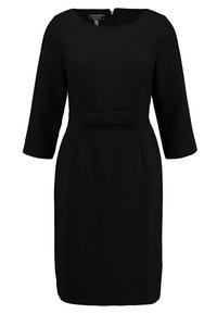 Robe noire avec un col rond, des manches trois-quarts, une taille cintrée, un détail de nœud et deux poches latérales, en tissu lisse.