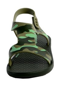 Camouflage slide sandals with a green and black pattern, rubber material, adjustable strap, and textured sole for grip.