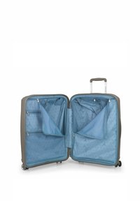 Valigia a rotelle con esterno grigio, interno a motivo blu, numerose tasche con cerniera e manico estensibile per un facile trasporto.