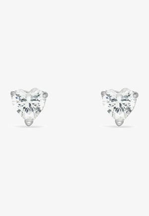 Heart-shaped earrings featuring clear, faceted stones set in silver-tone metal. The design highlights a classic minimalist style.