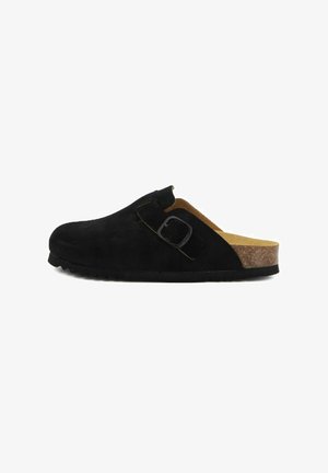 Black suede clog with a cork base, side buckle detail, rounded toe, and a textured rubber sole for grip. Open back design.