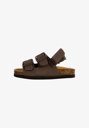 Sandale pour tout-petit en daim marron avec deux sangles à boucle et une sangle de talon réglable en Velcro sur une semelle en liège.