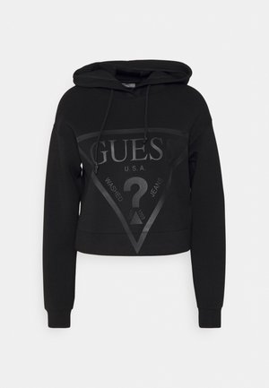 Black cropped hoodie with a hood, featuring a matte triangle logo and text design on the front. Made from a soft, cotton blend material.