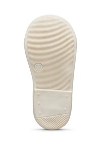 Suola di scarpa in gomma bianca con una superficie testurizzata, scanalature orizzontali e cinque indentazioni circolari vicino al tallone. Numero "19" visibile.