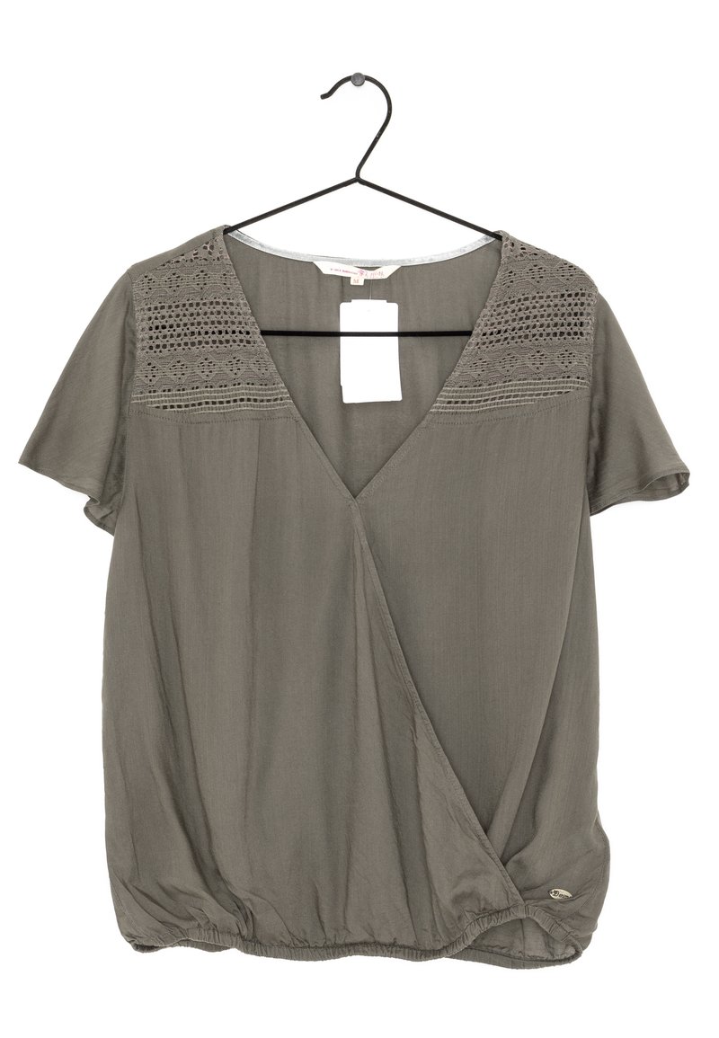 Olive green short-sleeve blouse with lace detailing on shoulders, deep V-neck, and gathered bottom hem. Tag attached.