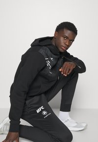 Venum UFC FIGHT NIGHT ADRENALINE JOGGERS - Træningsbukser - blue