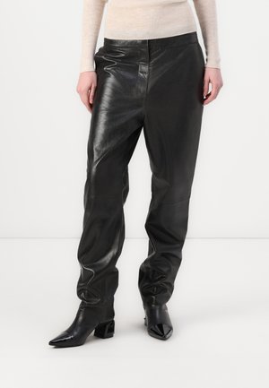 ANJI - Pantalon en cuir - black