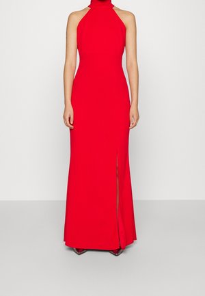 Röd halterneck maxiklänning med en åtsittande silhuett och en sidoklyfta, tillverkad av smidigt tyg. Har minimala sömmar och en elegant design.