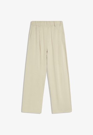 Pantalon beige taille haute avec ceinture élastique, jambes larges et poches latérales, présenté sur fond blanc.