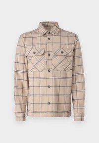 Beige geruit shirt gemaakt van textuurstof, met twee borstzakken, knoopsluitingen en zwarte accenten op het patroon.