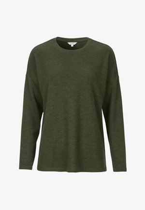 Grön långärmad skjorta i texturerad tyg. Har rund halsringning och avslappnad passform med sänkta axlar. Enkel design, inga mönster.