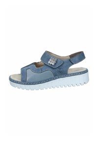 Blue sandal with a textured upper, adjustable strap, and decorative silver accents. Features a white, chunky sole for added comfort.