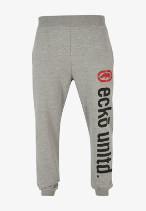 Gray sweatpants made of cotton blend fabric, featuring an elastic waistband, tapered cuffs, and bold black print with red logo on the left side.