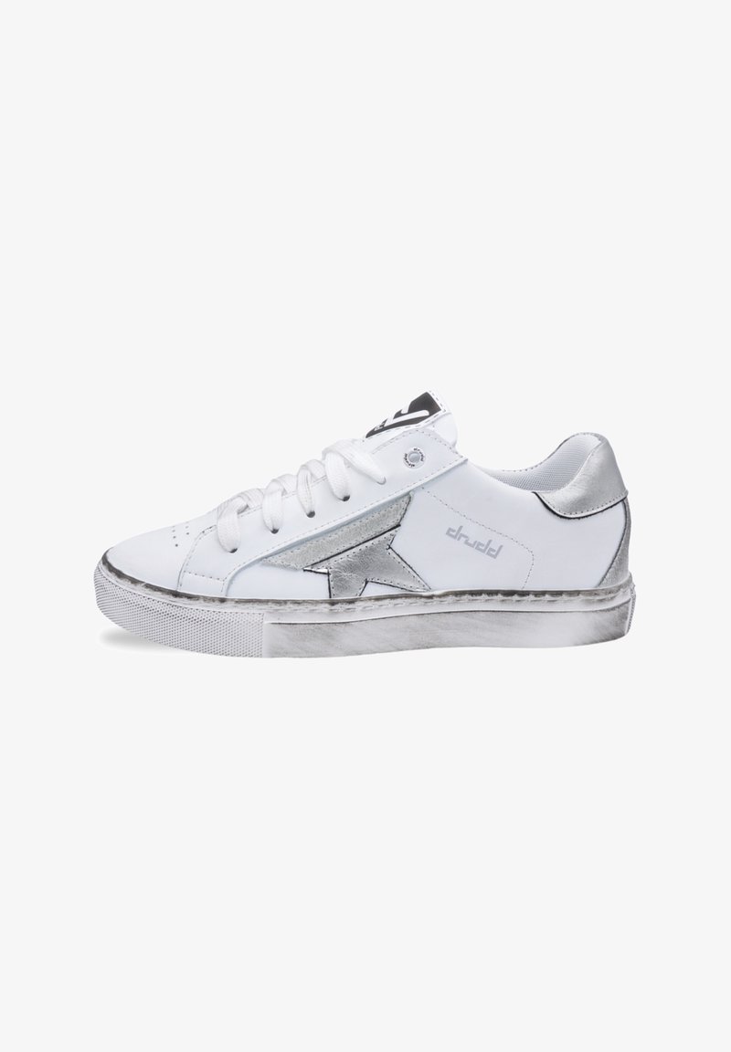 White sneakers with silver accents, lace-up design, textured rubber sole, and a stitched star detail on the side. Slightly worn appearance.