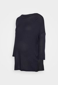 Blusa de maternidade em azul marinho escuro, com um corte relaxado, mangas três quartos, tecido de malha leve e decote redondo.