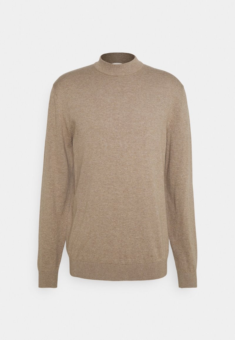 Beige coltrui gemaakt van fijn gebreid materiaal, met lange mouwen en een geribde halslijn en zoom.