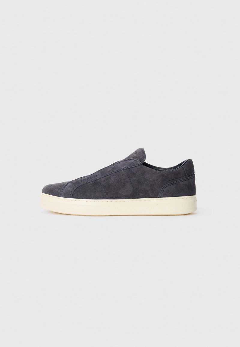 Dark gray suede slip-on sneaker with white sole, side view on a plain light gray background.