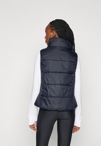 Under Armour INSULATE VEST - Brezrokavnik - black/white