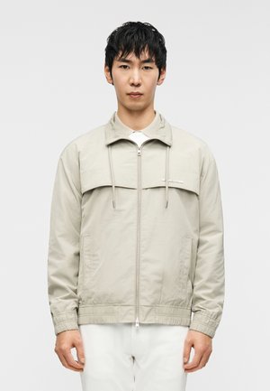 MOCK NECK WINDBREAKER - Vetrovka - stone