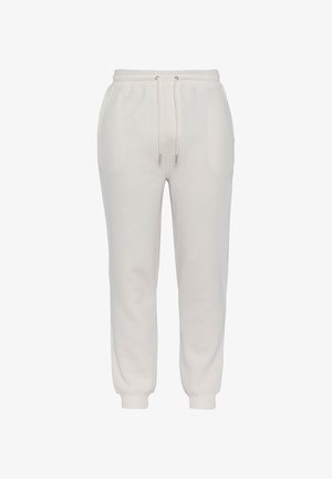 Lichtbeige sweatpants van zacht materiaal, met een elastische tailleband, trekkoord en taps toelopende boorden. Twee zijzakken zichtbaar.