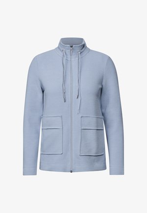 Light blue zip-up sweatshirt with a high collar, two front patch pockets, elastic drawstring, and textured fabric.