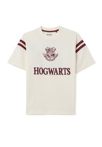 Crème-kleurig katoenen T-shirt met een maroen Hogwarts-logo en tekst, met maroenen strepen op de mouwen. Korte mouwen, relaxte pasvorm.