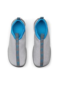 Gray shoes with a textured fabric upper, blue inner lining, and a gray pull tab featuring blue accents on the side. Flat sole design.