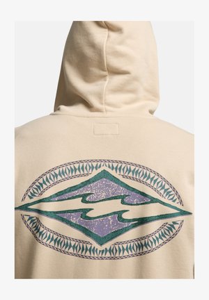 Felpa con cappuccio beige vista da dietro con un design a onde geometriche turchese e viola racchiuso in un motivo ovale decorativo.