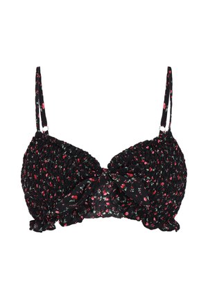 Sort rynket bikinitop med tynde justerbare stropper, pyntet med et lille rødt og hvidt blomsterprint og en sløjfedetalje foran.