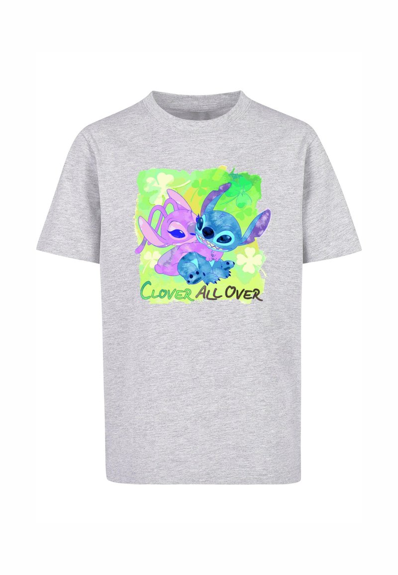 Grå bomulds T-shirt med et farverigt grafisk motiv af to tegneseriefigurer på en grøn baggrund med kløver-mønster. Teksten siger "CLOVER ALL OVER."