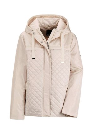 Veste matelassée beige clair avec capuche amovible, fermeture éclair sur le devant, deux poches et accents de cordon de serrage. Texture lisse, design décontracté.