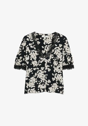 Černá květinová blůza s bílými květinovými vzory, s krajkovým výstřihem do V, krátkými rukávy a mašlí na přední straně.