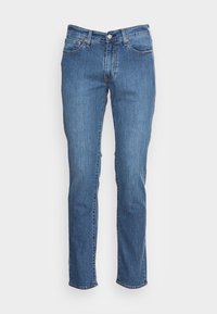 Pantalones jeans de mezclilla azul con un corte recto, diseño de cinco bolsillos, costuras visibles y herrajes metálicos. Lavado clásico con ligeras variaciones de textura.