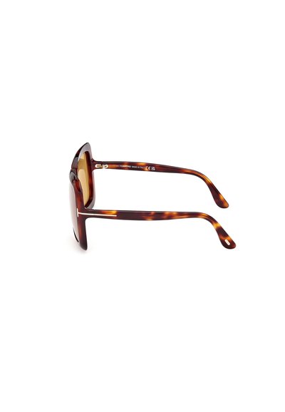 Ochelari de soare cu model țestoasă, cu un cadru chunky, lentile curbe și brațe subțiri. Prezintă un accent minimalist de argint pe braț.