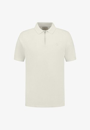 Polo s kratkimi rokavi v kremni barvi, izdelan iz bombaža, z ovratnikom na zadrgo in izvezenim logotipom na levem prsnem delu. Preprost dizajn.