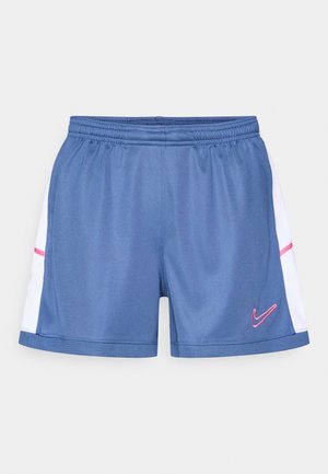 Shorts de sport bleus avec taille élastique, panneaux latéraux blancs et accents roses. Logo Nike sur le bas devant. Texture de tissu lisse.