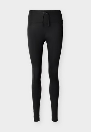 Μαύροι leggings ψηλόμεσοι, στενής εφαρμογής με κορδόνι στη μέση, κατασκευασμένοι από λείο, ελαστικό ύφασμα, παρουσιασμένοι σε απλό φόντο.