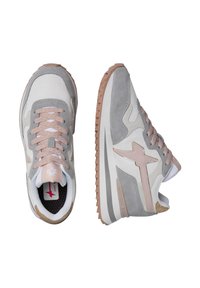 Athletic sneakers featuring a gray suede and mesh upper, pink accents, lace closure, and a textured rubber sole with zigzag tread.