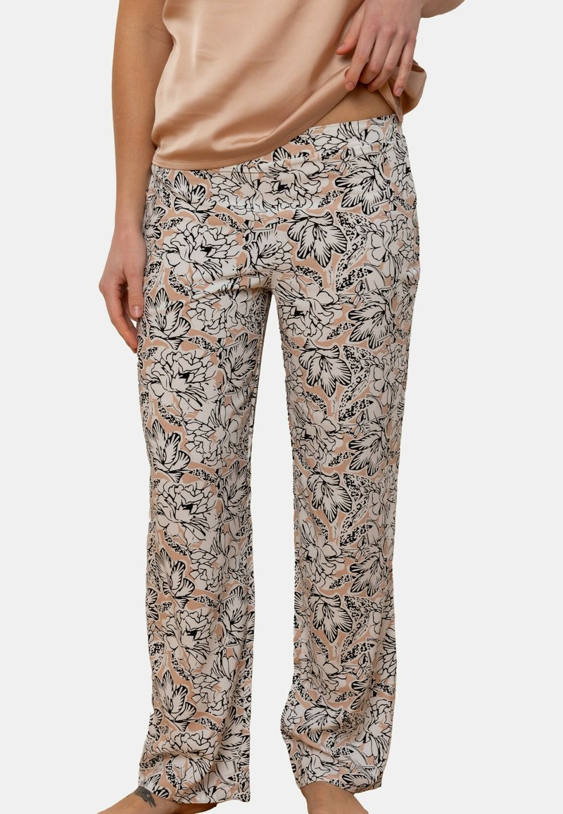 Pantalons à motif floral en pêche et noir, en tissu léger, avec une coupe décontractée et un subtil éclat.