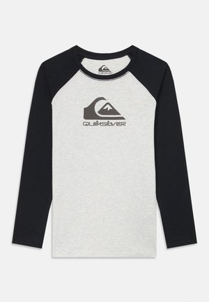 Long-sleeve shirt with gray body and navy blue raglan sleeves; features a Quiksilver logo in dark gray on the chest.