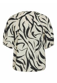 Blusa de manga corta en color crema con patrones abstractos en negro, que presenta un corte relajado, escote redondo y detalles fruncidos en las mangas.