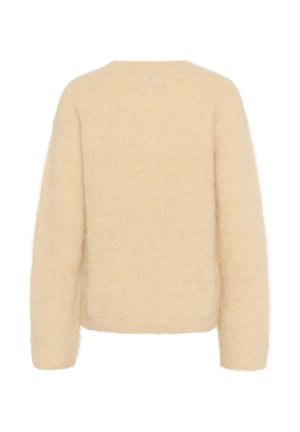 Pull en beige, moelleux, avec une coupe décontractée, un col rond et des manches longues. Texture douce sans motifs ou accents visibles.