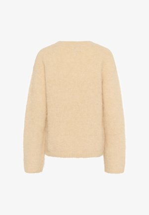 Bež, koheline ja pehme lõngaga pullover, millel on avar istuvus, ümmargune kaelus ja pikad varrukad. Pehme tekstuur ilma nähtavate mustrite või aktsentideta.