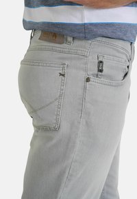 BRAX STYLE COOPER - Straight leg jeans - grey used