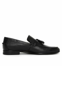 Black leather loafers with a textured finish, featuring a decorative tassel detail and a low, sleek sole. Side view displayed.