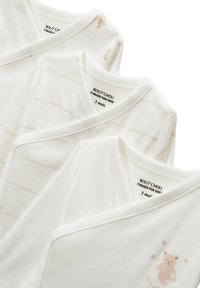 Trois bodies en coton blanc pour bébés avec un col en V, ornés d'un doux imprimé d'ours et de rayures beiges avec du texte. Taille : 3 mois.